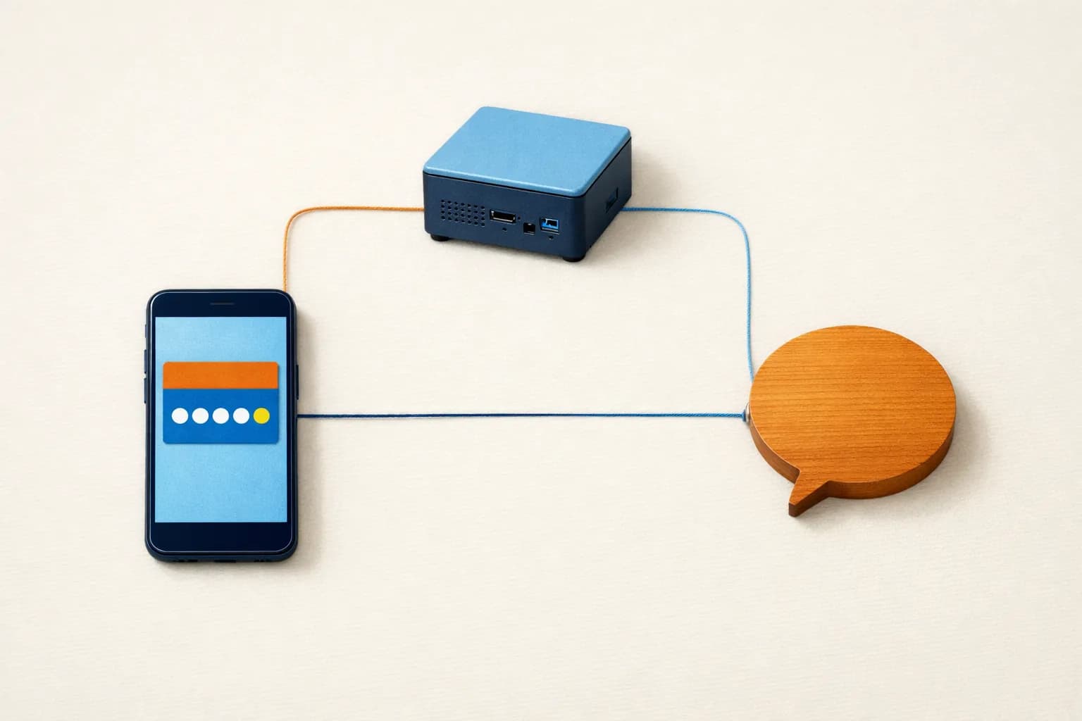 Vista cenital de un teléfono, una pequeña caja de servidor y un objeto en forma de globo de mensaje conectados por finos hilos.